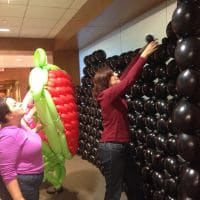 Kenwyn working on balloon wall