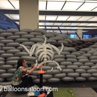 Tracy working on Pterodactyl Balloon Wall
